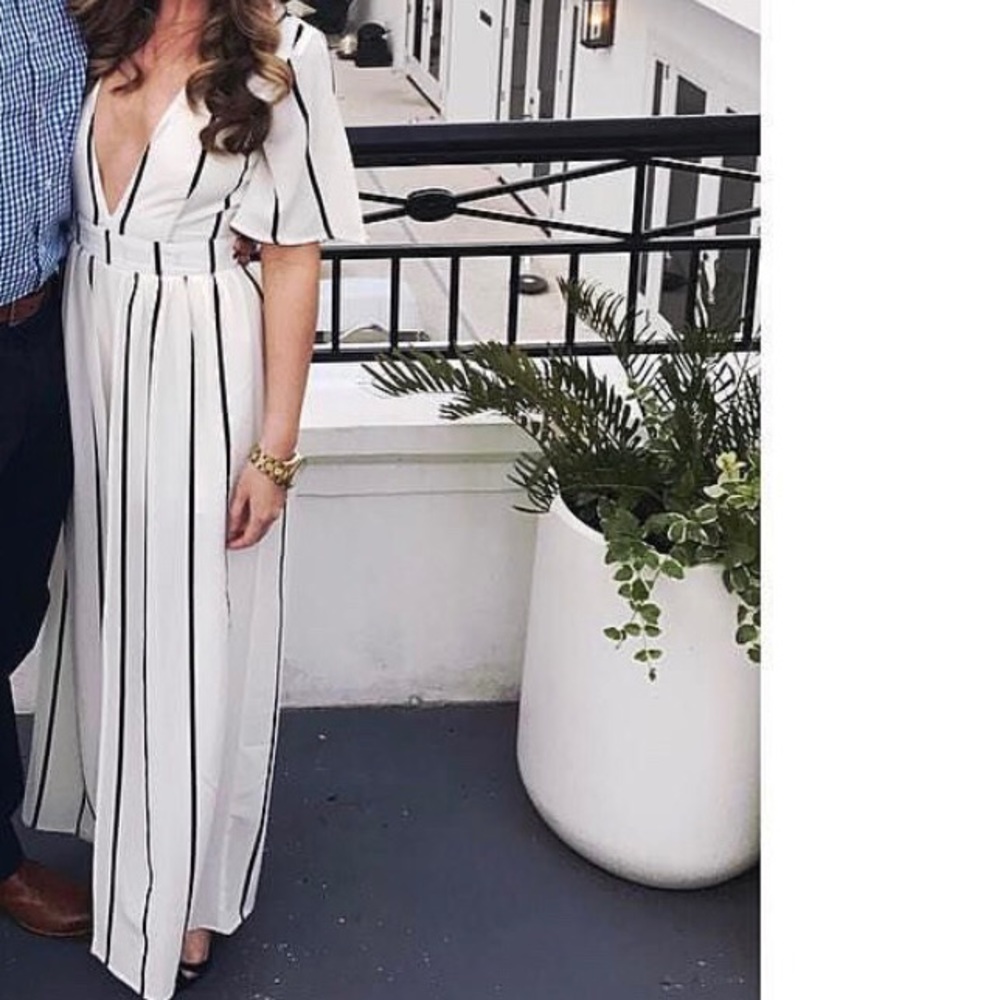 White and black stripe romper with dress over lay